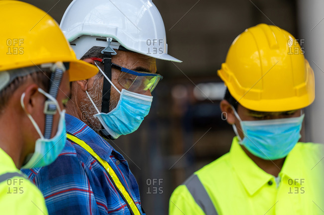 Engineer wearing protective mask to Protect Against Covid-19 at