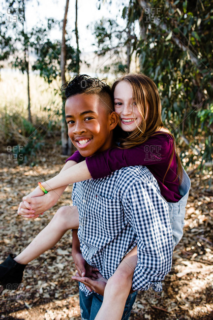 Brother and Sister Posing for a Photo Together Stock Image - Image of  couple, looking: 140391721