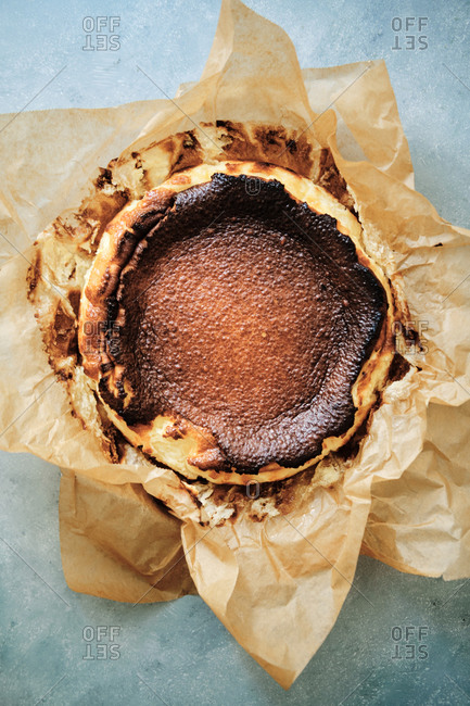 Burnt caramelized basque cheesecake in baking paper