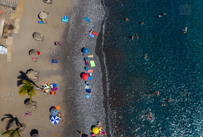 Aerial view of black sanding volcanic beach in Playa San Juan, Tenerife, Canary islands, Spain.