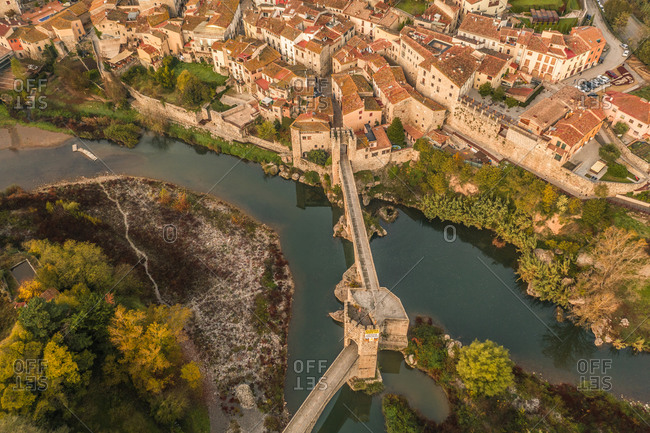 Aerial view of Pont de Besalu medieval bridge crossing the El Fluvia river in Besalù, Girona, Spain.
