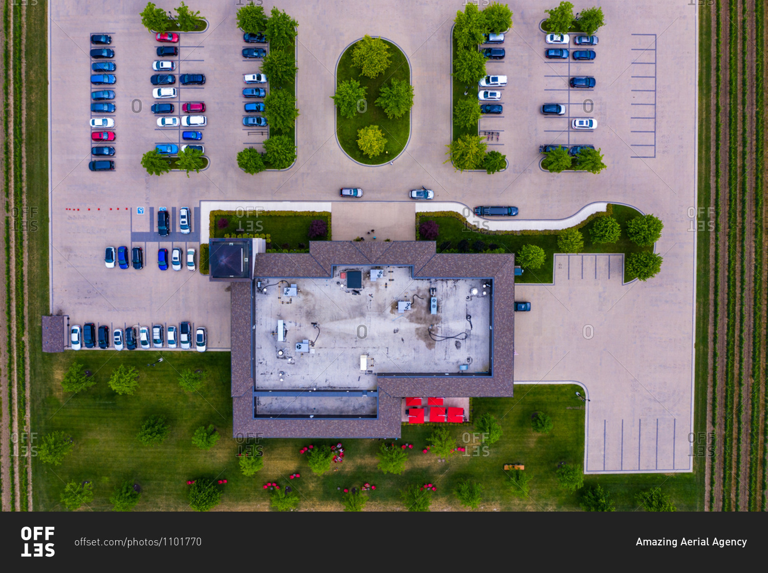 Aerial view of a small parking lot next to the vineyard near the Lake Ontario, Canada.