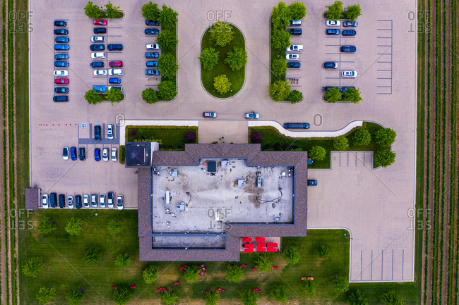 Aerial view of a small parking lot next to the vineyard near the Lake Ontario, Canada.