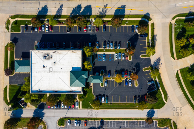 Aerial view of a parking lot busy of vehicles in a small residential park in Columbia, Missouri. United States of America