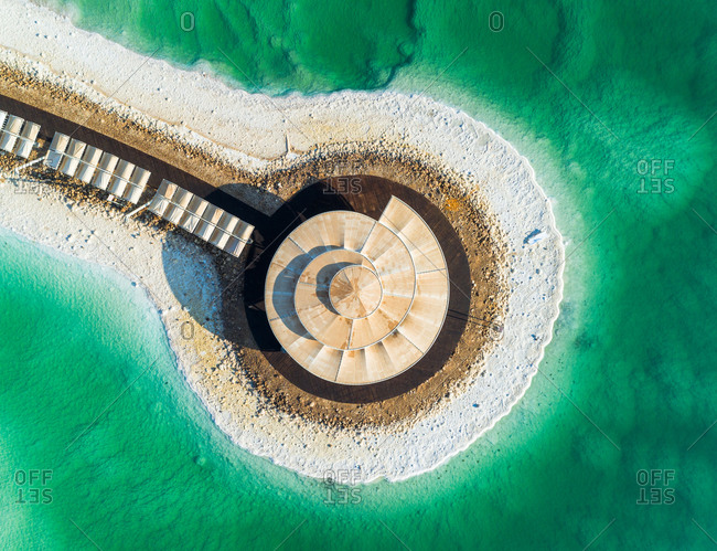 Aerial view in-sea gazebo surrounded by salt water in a hotel area. The Dead sea, Negev, Israel.