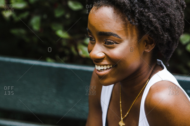 Portrait of a black woman with a grin on her face