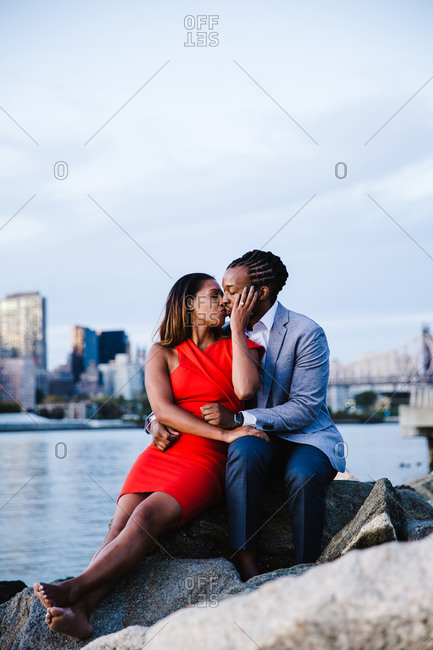 Couple doing yoga and kissing at seaside - a Royalty Free Stock Photo from  Photocase