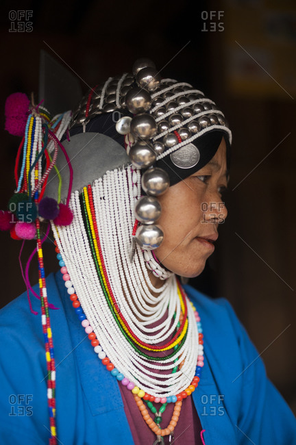 Kyaington, Keng Tung, Shan State, Myanmar - March 28, 2010: An Akha woman wearing traditional dress