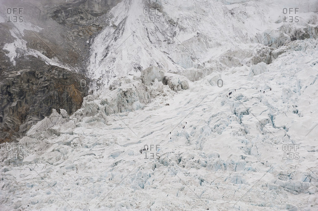 Climbers make their way through the massive seracs and crevases that make the Khumbu ice fall