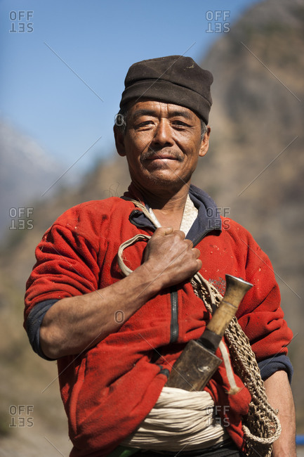 A shepherd with a traditional Kukri knife in the Manaslu region