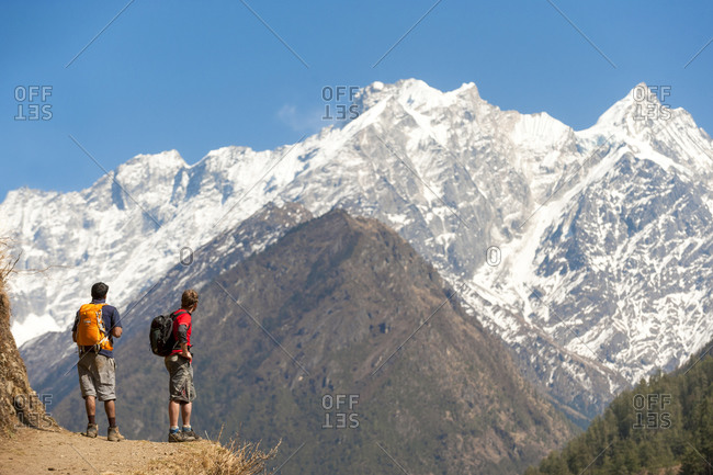 Trekkers in the Tsum valley admire views of the Ganesh Himal mountains