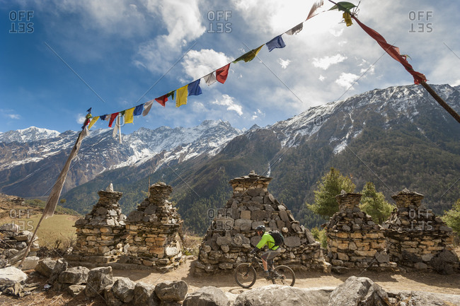 Chortens, prayer flags and perfect trails make the Tsum valley a stunning area for mountain biking