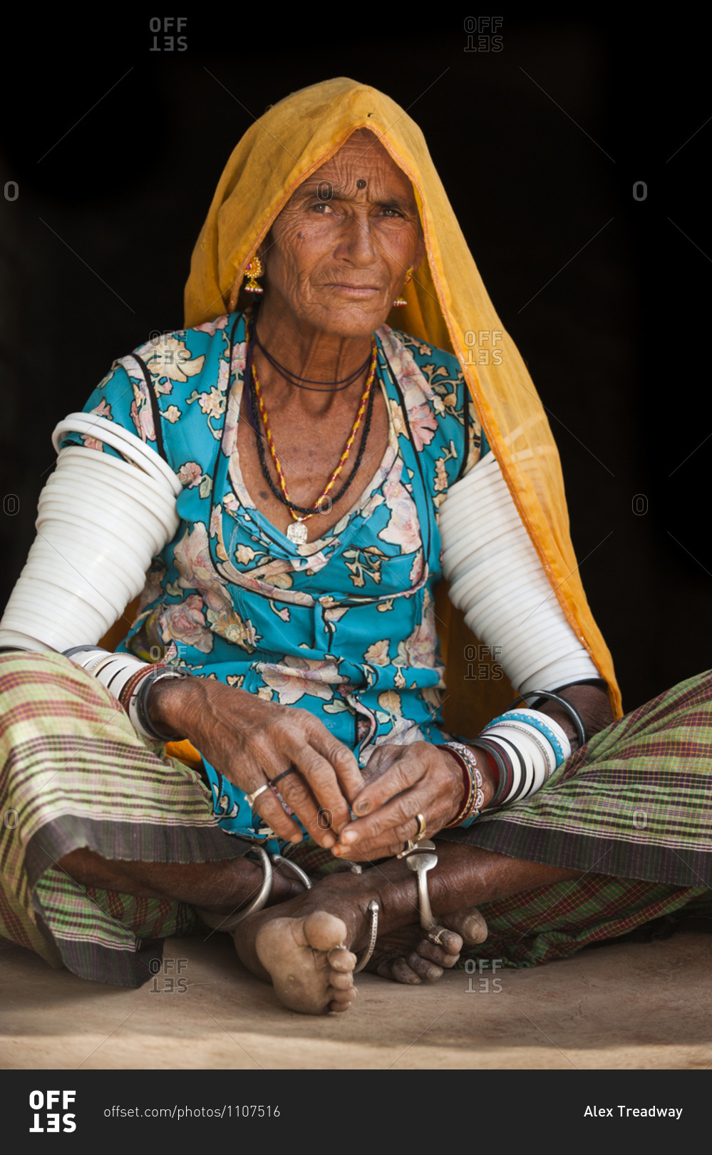 An old Rajasthani woman wearing traditional dress and bangles