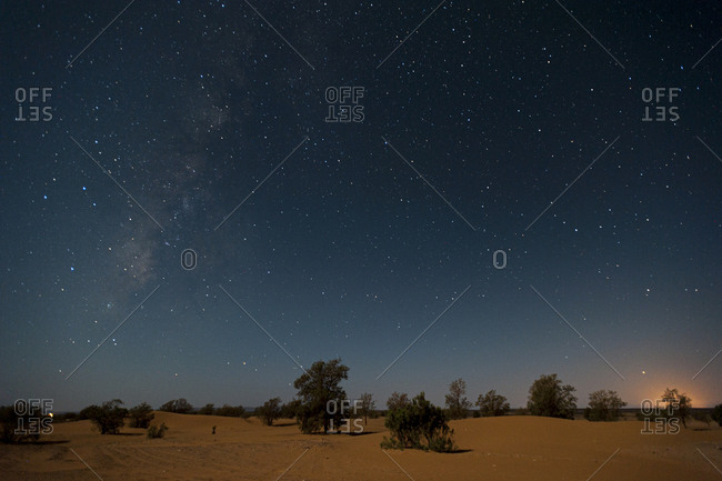 Erg Chebbi sand dunes in the Western Sahara under a night sky