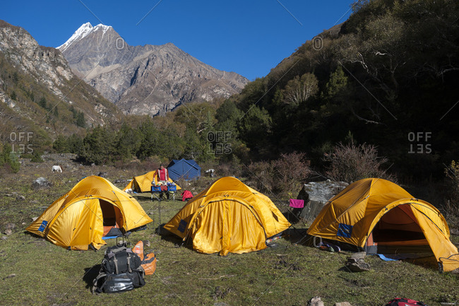 Shey Phoksundo National Park, Dolpo, Dolpa, Nepal - October 8, 2012: A trekking group sets camp the little visited Kagmara valley in the remote region of Dolpa in Nepal