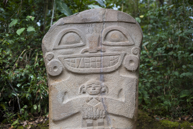 An ancient pre-Columbia stone carving in the jungle at San Agustin in the south of Colombia