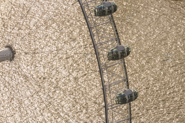 London, England - October 6, 2013: An aerial view of The London Eye with the river Thames behind