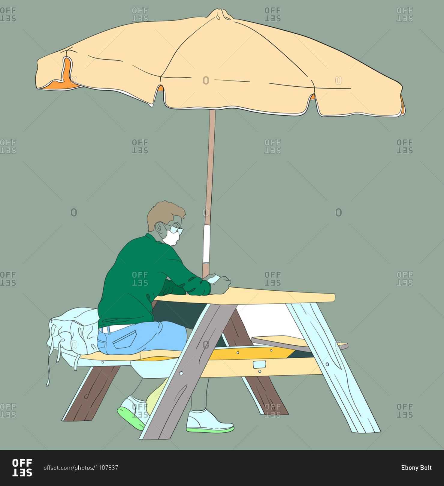 Young man wearing a mask and waiting at a wooden table under\
an umbrella at the beach stock photo - OFFSET