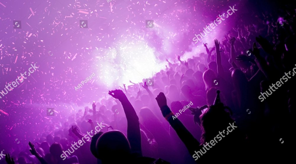 Party goers in a nightclub with co2 cannons firing