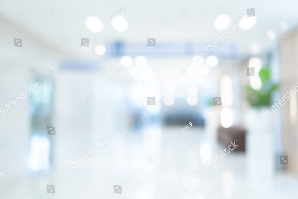 Abstract blur luxury hospital corridor. Blur clinic interior background with defocused effect. Healthcare and medical concept