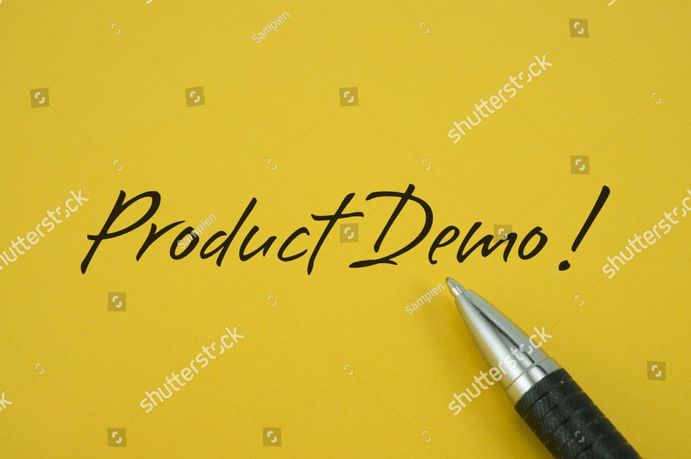 Product Demo! note with pen on yellow background