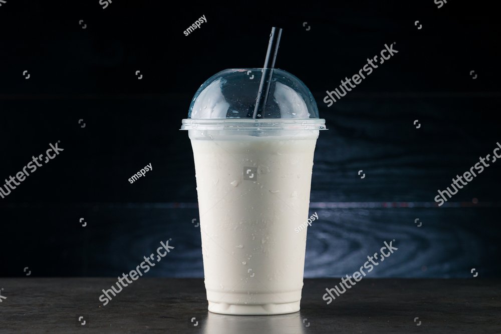 Cookies and cream milkshake in a takeaway cup isolated on white