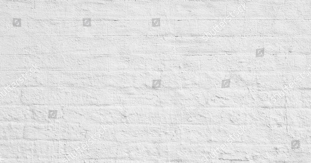 The background of the old white brick wall for design interior and  various scenes or as a background for video interviews.