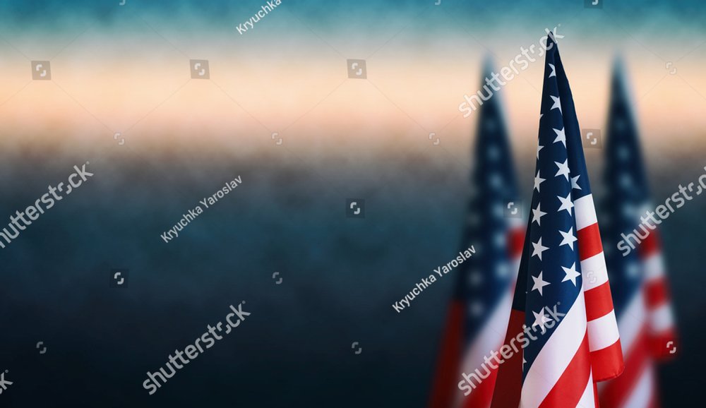 Happy Veterans Day background, American flags against a blue fog background, November 11, American flag Memorial Day, 4th of July, Labour Day, Independence Day.