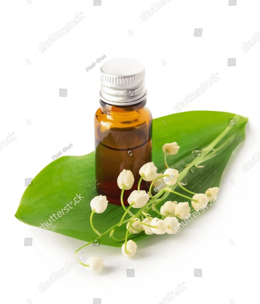 Bottle with essential oil and lily-of-the-valley flowers on white