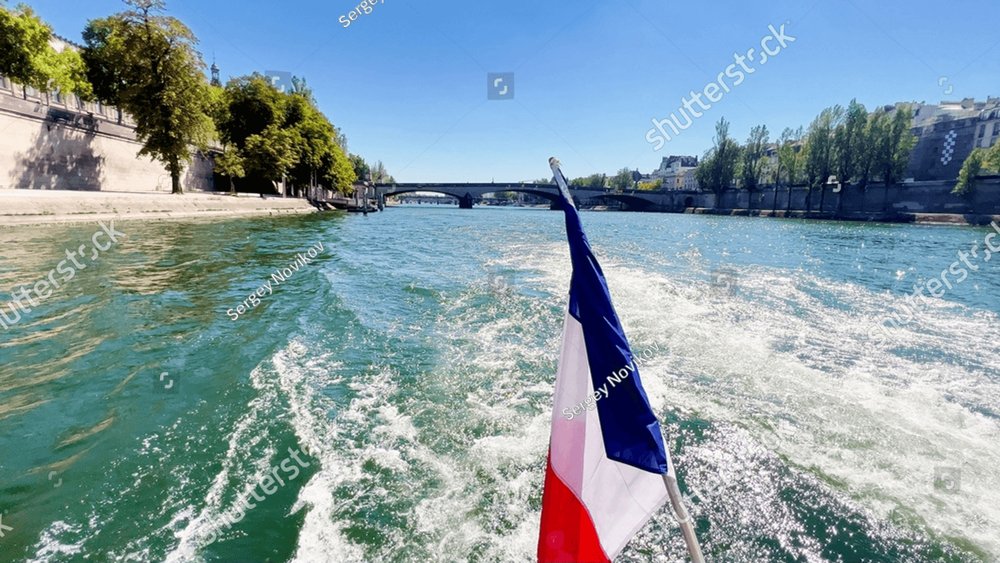 French flag close-up on the boat over the Seine river in Paris on