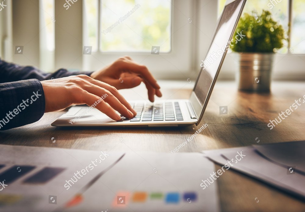 businessman using laptop computer sitting working office.