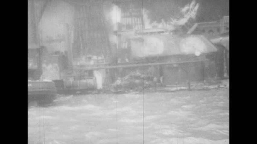 UNITED STATES 1940s: Views of destroyed battleships in Pearl Harbor.