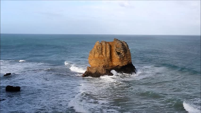 Eagle Rock is a tall volcanic stack capped by limestone located near the Split Point Lighthouse in Victoria, Australia