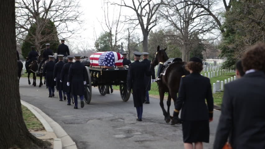 Military Funeral Marching in Cemetery