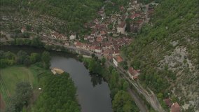 AERIAL France-Larnagol And Water Mill 2006: Small village in cleft between hills by River Lot
