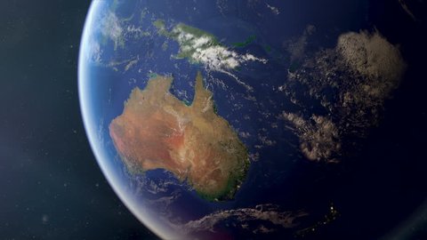 Orbiting over Australia from space. Photorealistic 3d animation, created using extremely high resolution (50k+) Nasa textures. As the sun sets you see the cities light up.