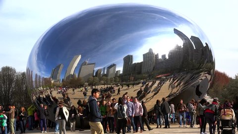 CHICAGO - APRIL 17:
Crowd tourists at the Cloud Gate sculpture in the Millennium Park. 
April 17, 2015 in Chicago, Illinois, USA