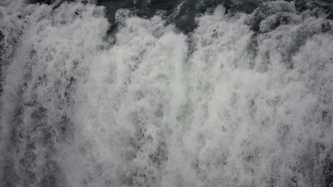 Slowmotion of Gullfoss waterfall close up in Iceland in wintertime