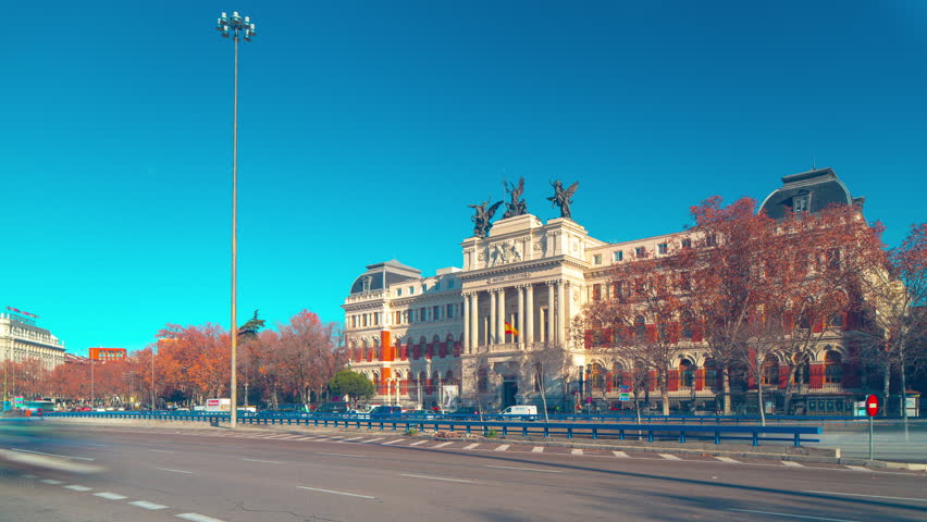 ministry of agricultura front traffic street panorama 4k time lapse spain madrid