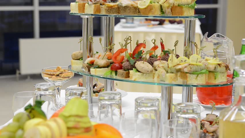 Table with food and glasses of juice | Shutterstock HD Video #1005602860