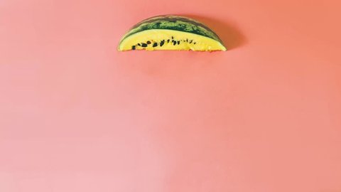 from a piece of yellow watermelon the rain is pouring. surreal and fantasy. minimal art