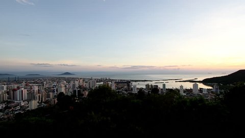 ITAJAI, SC - BRAZIL  - Time Lapse - View of the city at dawn, input and output port ships.