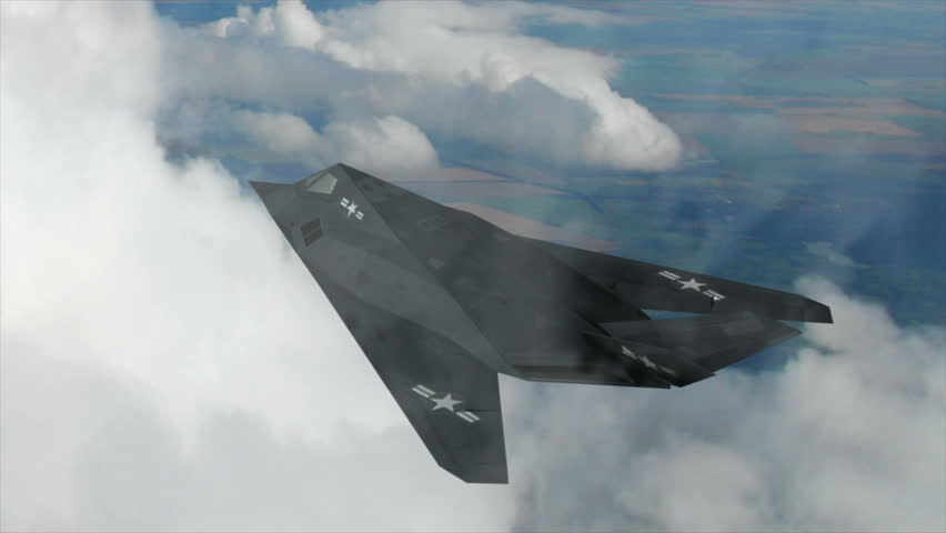  F-117 Nighthawk stealth aircraft flying in the sky among the clouds.