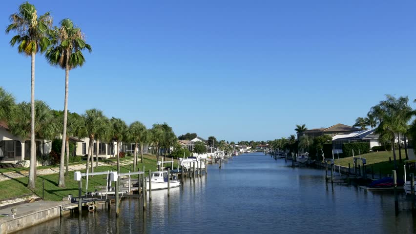 Waterfront homes on Florida canal, 4K