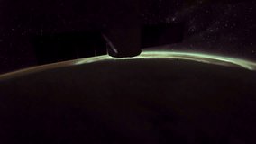 ISS view of rotating planet earth with aurora and star galaxy. Created from Public Domain images, courtesy of NASA JSC : http://eol.jsc.nasa.gov. 