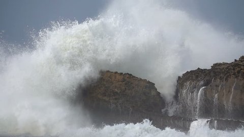 Extreme wave crushing coast slowmo, Big wave. Large Ocean Wave,Awesome power of giant waves breaking over dangerous rocks 