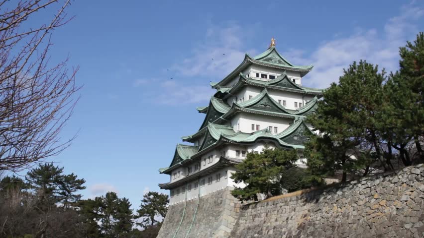 Nagoya castle in Japan during autumn fall seasons. Windy day at Castle tower of Nagoya castle in Japan. 