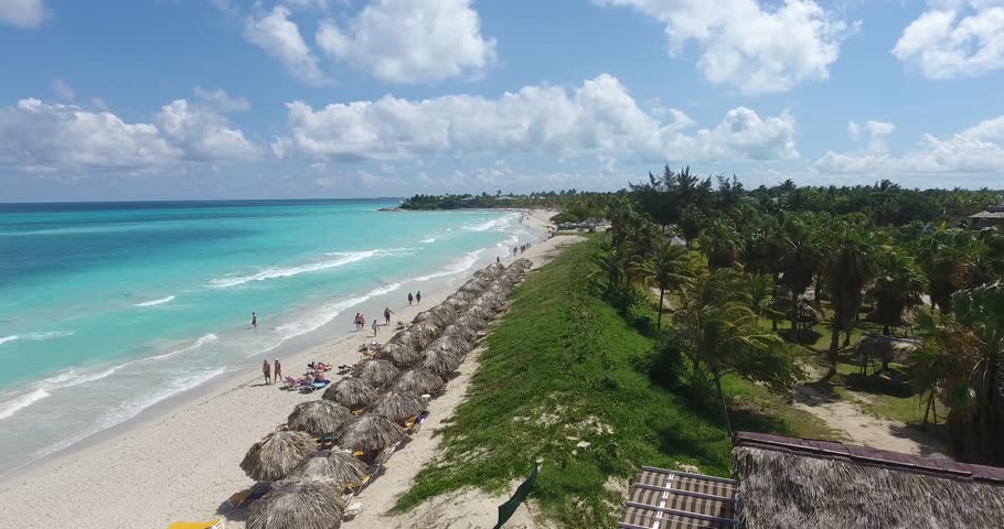 Drone flying over Varadero, Cuba. Aerial view of Cuban beach and Caribbean Sea. Landscape seen from the sky with ocean waters. Travel destination for tourism, holidays and vacations Royalty-Free Stock Footage #1006607266