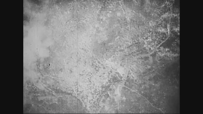 CIRCA 1910s - A German military plane drops bombs on a British General\xD5s headquarters, and gets into a dogfight with a British plane.