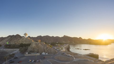 4K Aerial Beautiful Scenic Sunset Time lapse View of Muttrah Bay during sunset, Matrah, Oman. Day to Night. Zoom In Camera Motion Timelapse.